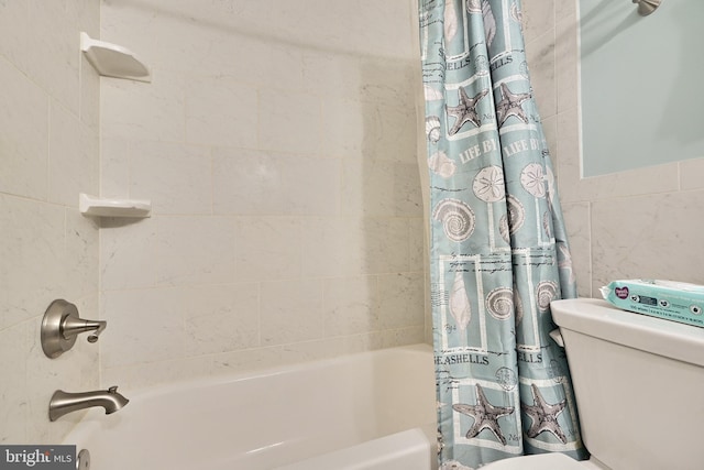 bathroom featuring toilet and shower / bathtub combination with curtain