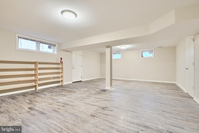 basement with wood-type flooring