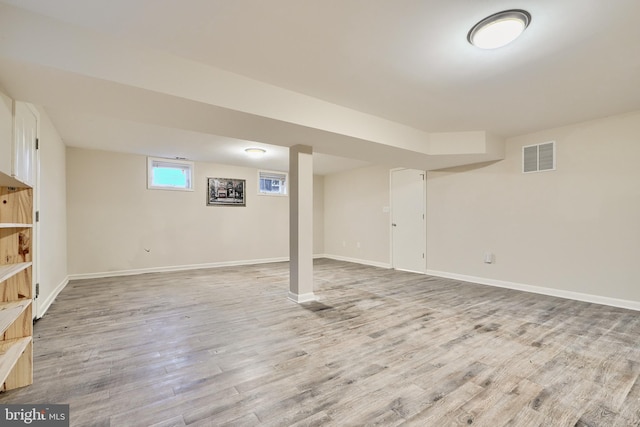 basement with light wood-type flooring