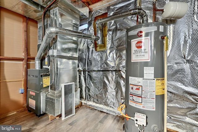 utility room featuring water heater