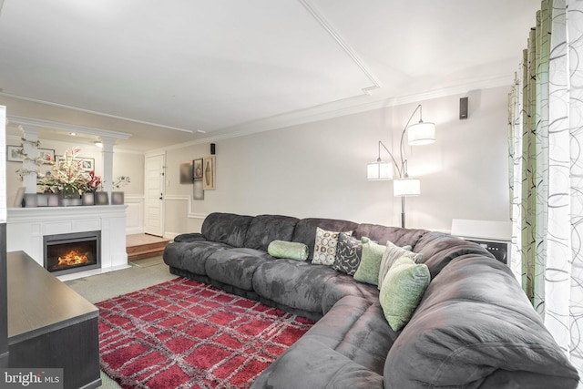 living room with carpet and ornamental molding