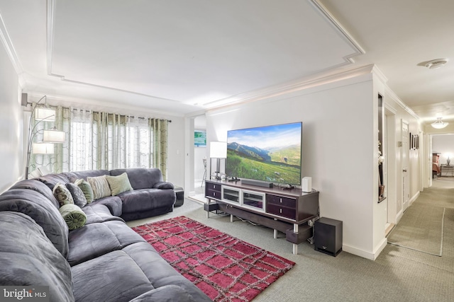 carpeted living room featuring ornamental molding