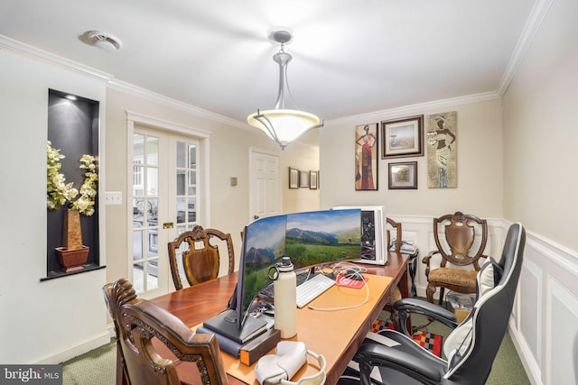 carpeted office featuring crown molding and french doors