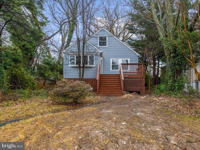 rear view of house with a deck