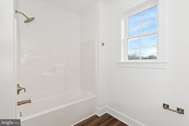 bathroom with  shower combination and hardwood / wood-style flooring