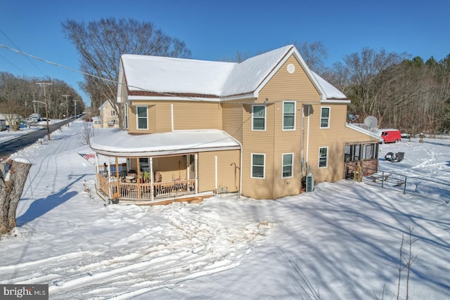 view of snow covered property