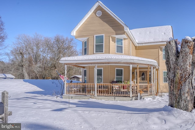 view of front of home featuring covered porch