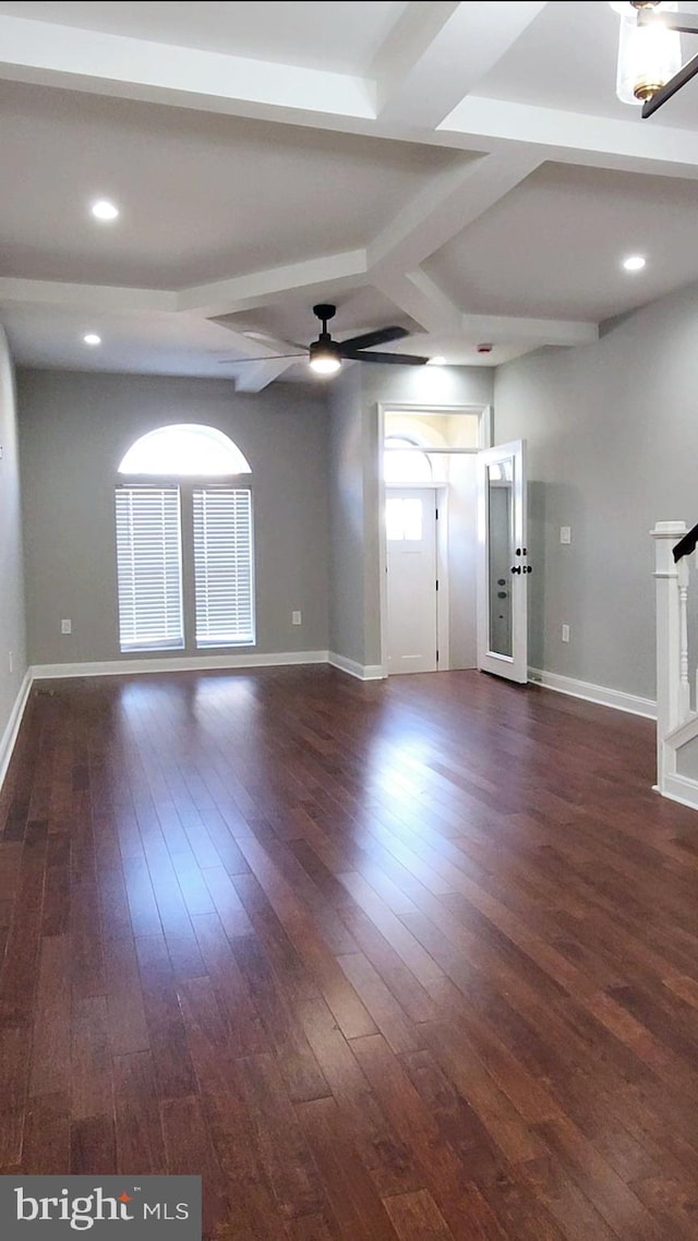 unfurnished living room featuring a ceiling fan, recessed lighting, dark wood-style flooring, and baseboards