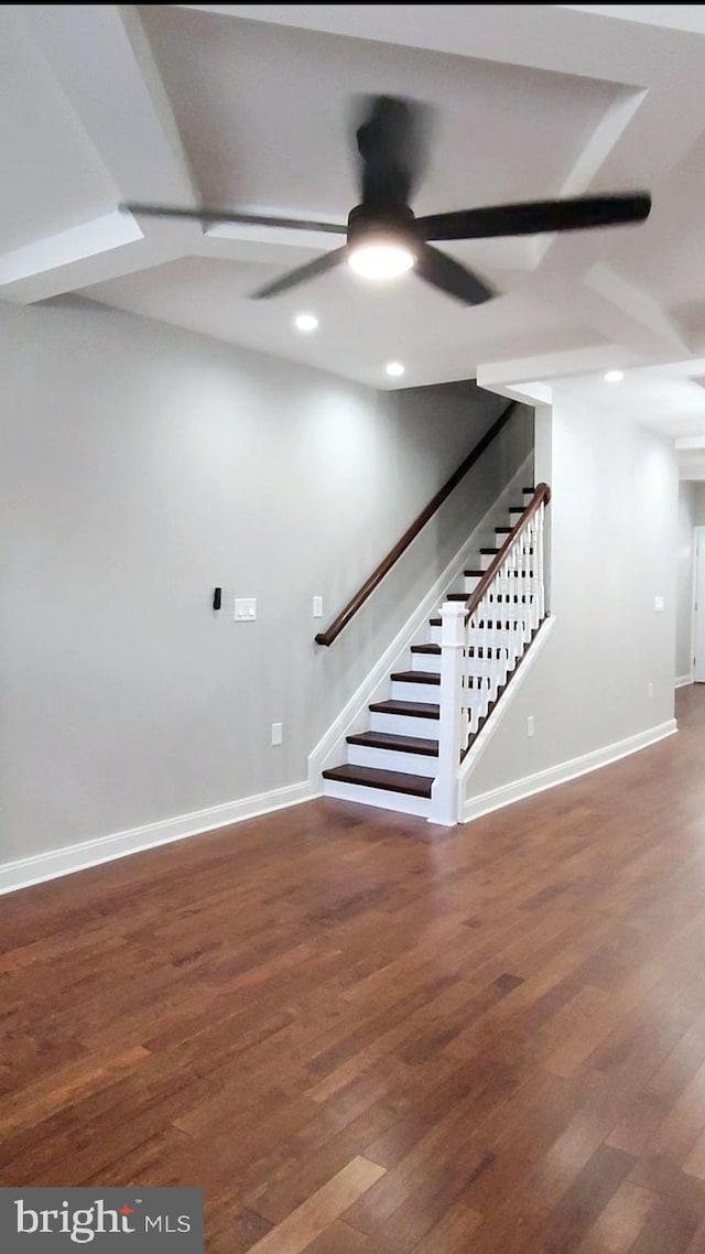 interior space with baseboards, a ceiling fan, wood finished floors, and recessed lighting