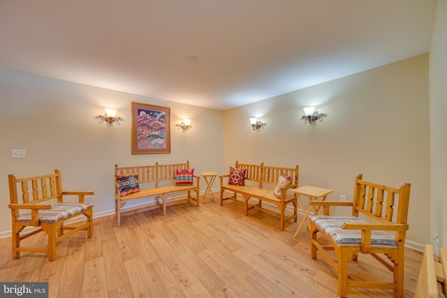 sitting room with light hardwood / wood-style floors