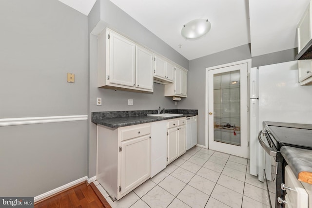 kitchen featuring black electric range, white cabinetry, dishwasher, and sink