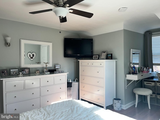 bedroom with ceiling fan and hardwood / wood-style flooring