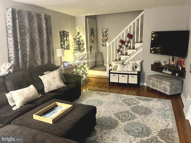 living room with dark wood-type flooring