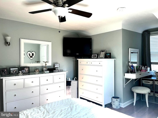 bedroom featuring hardwood / wood-style flooring and ceiling fan