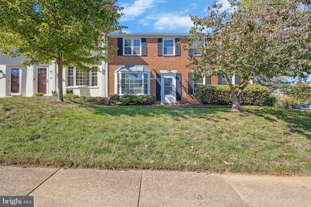 view of front of property with a front lawn