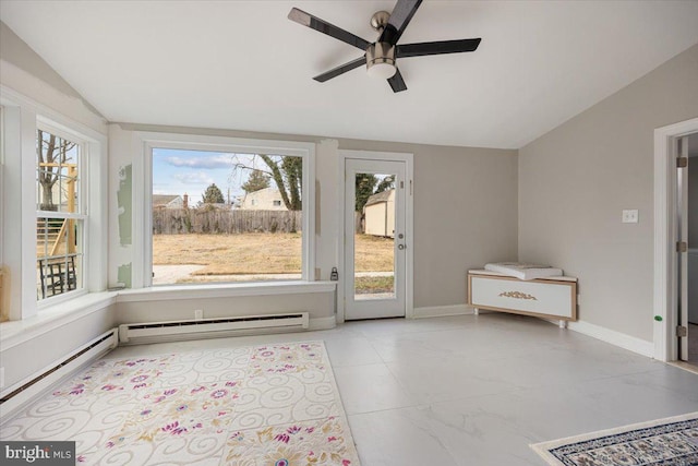 sunroom with ceiling fan, lofted ceiling, and a baseboard heating unit