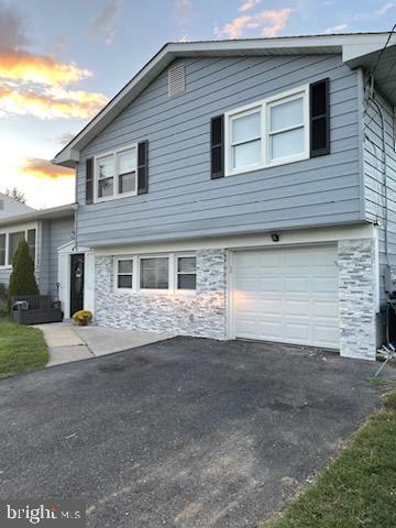 tri-level home with a garage