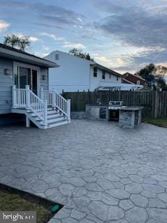 view of patio / terrace with exterior kitchen