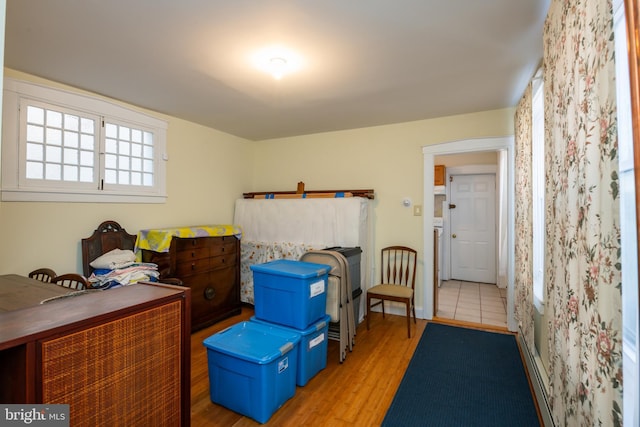 bedroom with wood finished floors