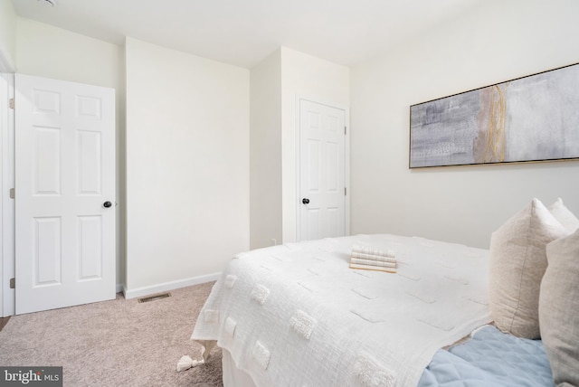 bedroom featuring carpet