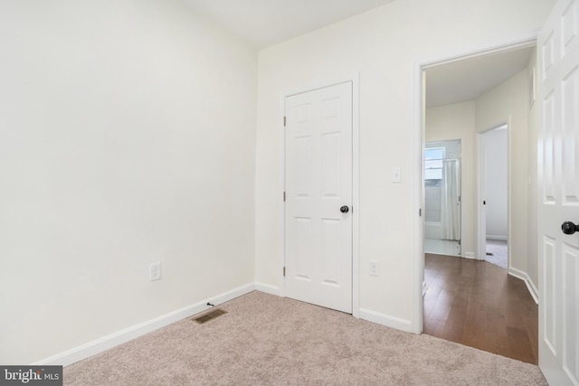 unfurnished bedroom featuring carpet floors