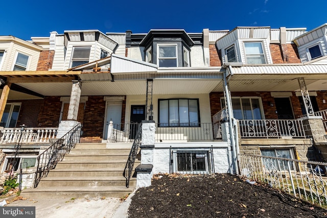 multi unit property featuring covered porch