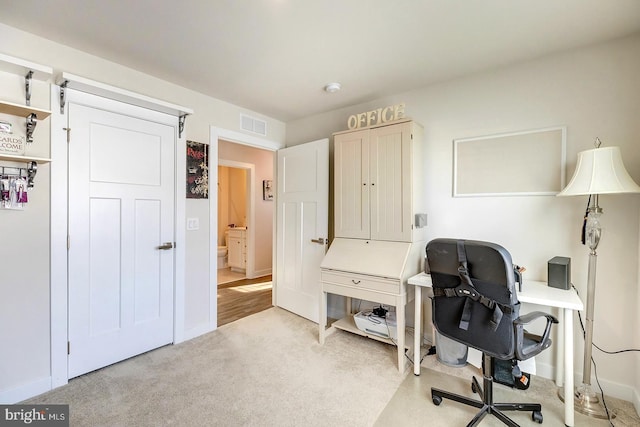 view of carpeted home office