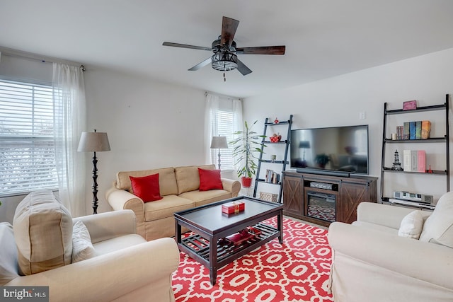 living room featuring ceiling fan