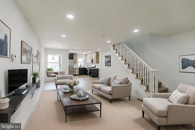 living room with light hardwood / wood-style floors