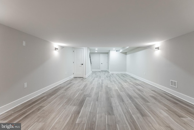 basement with light wood-type flooring