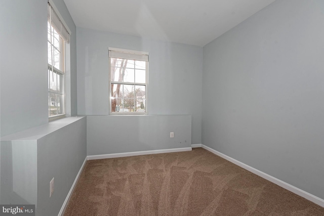 unfurnished room with carpet