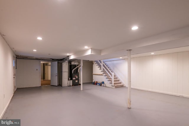 basement featuring heating unit