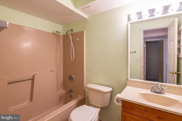 full bathroom featuring vanity, shower / bathtub combination, and toilet