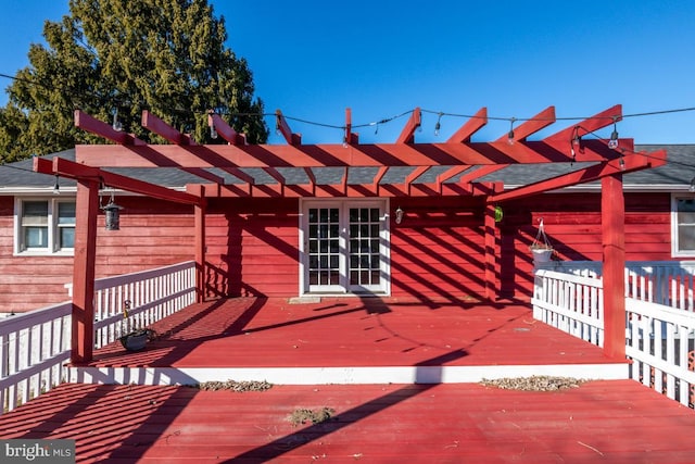 wooden deck with a pergola