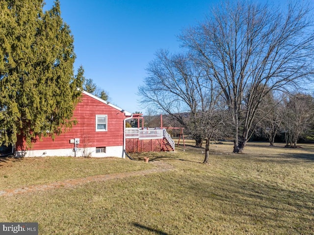 view of yard with a deck