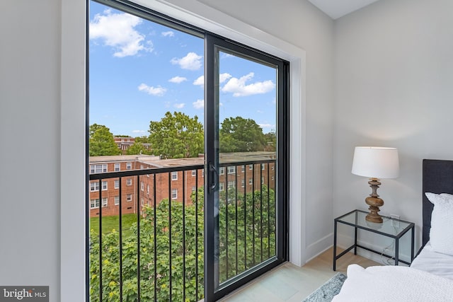 bedroom with light hardwood / wood-style floors