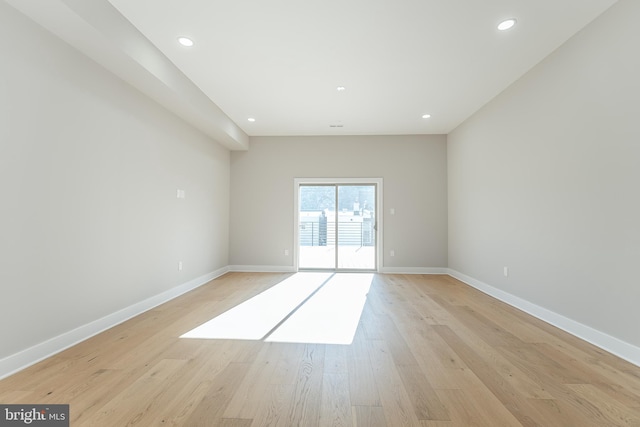 empty room with light wood-type flooring