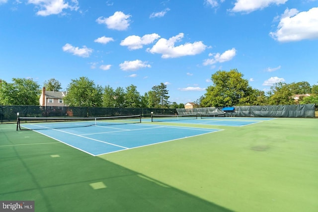 view of tennis court with basketball court