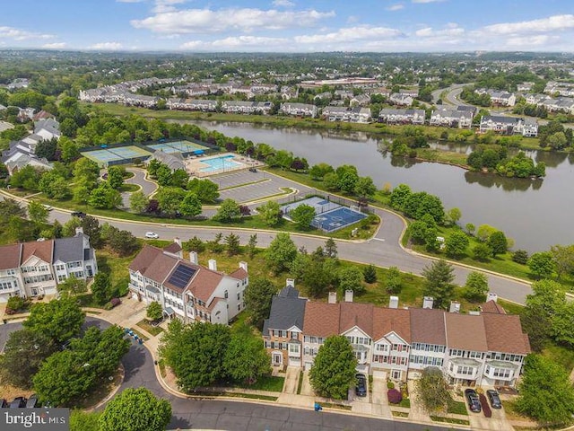 drone / aerial view with a water view