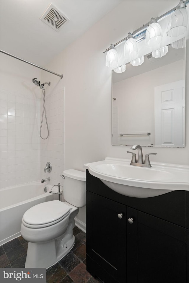 full bathroom featuring toilet, shower / bathtub combination, and vanity