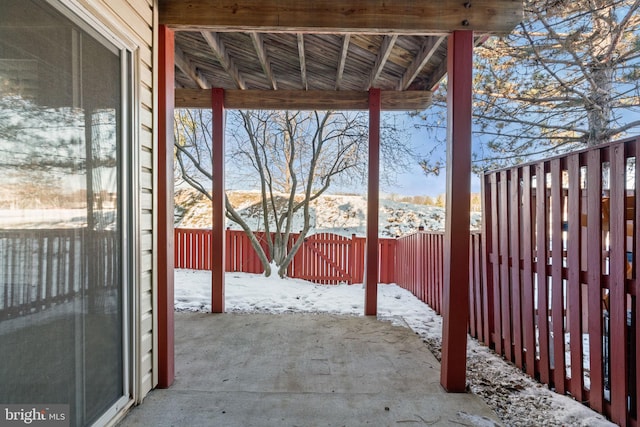 view of snow covered patio