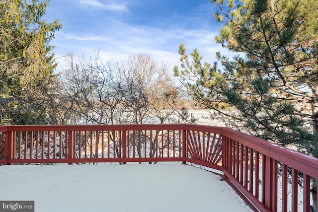 view of snow covered deck