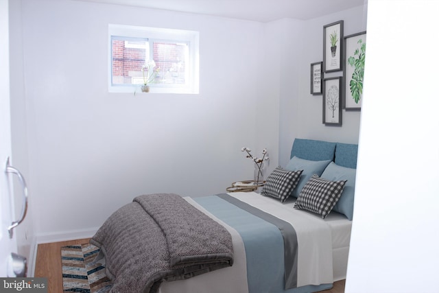 bedroom featuring hardwood / wood-style floors