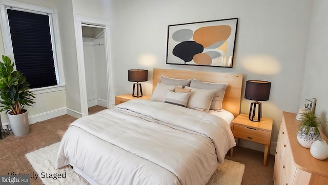 carpeted bedroom with a closet