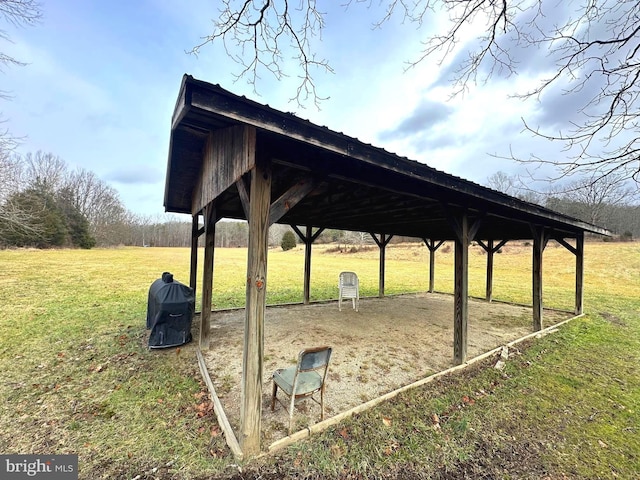 view of property's community with a yard