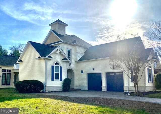 view of front of home with a front lawn