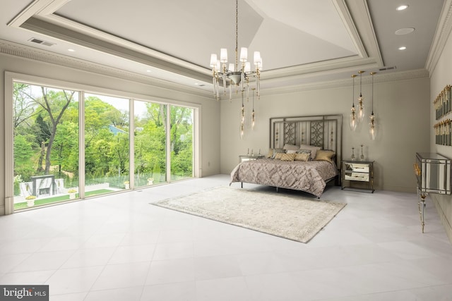 bedroom with a tray ceiling, ornamental molding, and a notable chandelier