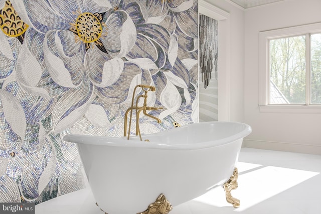 bathroom featuring a tub to relax in