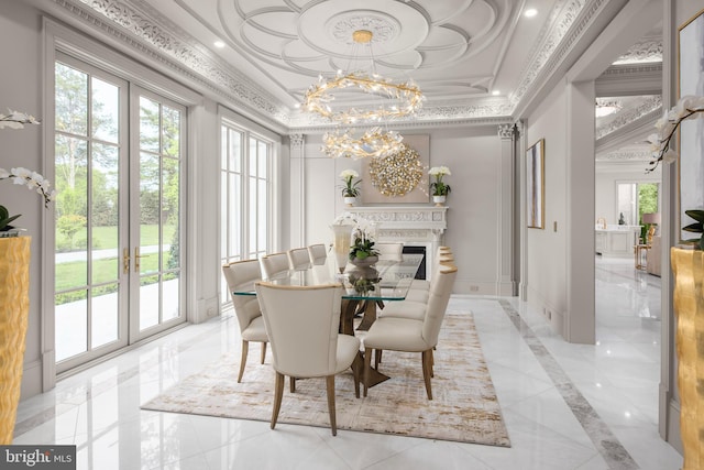 dining room featuring a notable chandelier and ornamental molding