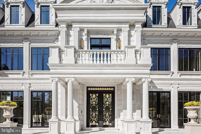 doorway to property featuring a balcony